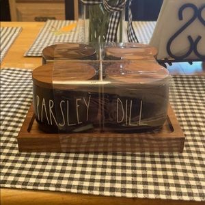 Rae Dunn spice canisters.